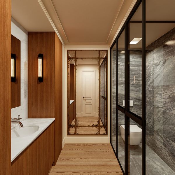 Baño con mármol, madera y mampara de vidrio